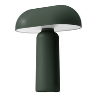 Green modern lamp with a smooth, curved base and a contrasting white shade, showcasing a sleek, minimalist design.