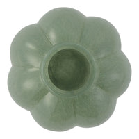 Light green flower-shaped vase with a smooth, glossy finish and subtle texture variations.