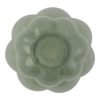 Light green flower-shaped bowl with smooth edges and subtle translucent patterns. Ideal for decorative use.