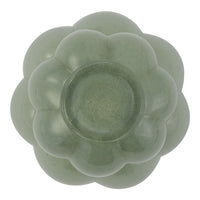 Green floral-shaped dish with a glossy finish, showcasing soft, smooth contours and a delicate pattern.