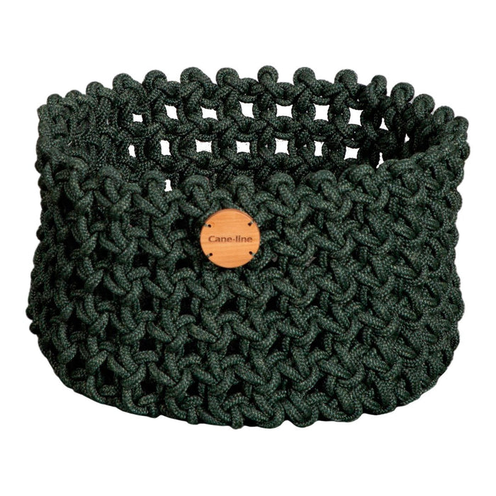 Green knitted storage basket with a textured, open pattern and a wooden tag.