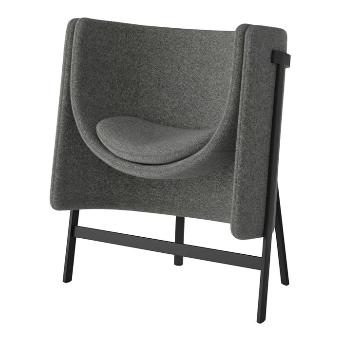 Gray upholstered armchair with a smooth, rounded design and sleek black metal frame. Modern minimalist style.