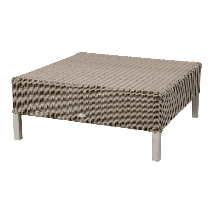 Brown woven outdoor coffee table with a textured pattern and sleek silver legs. Modern and stylish design for patio use.