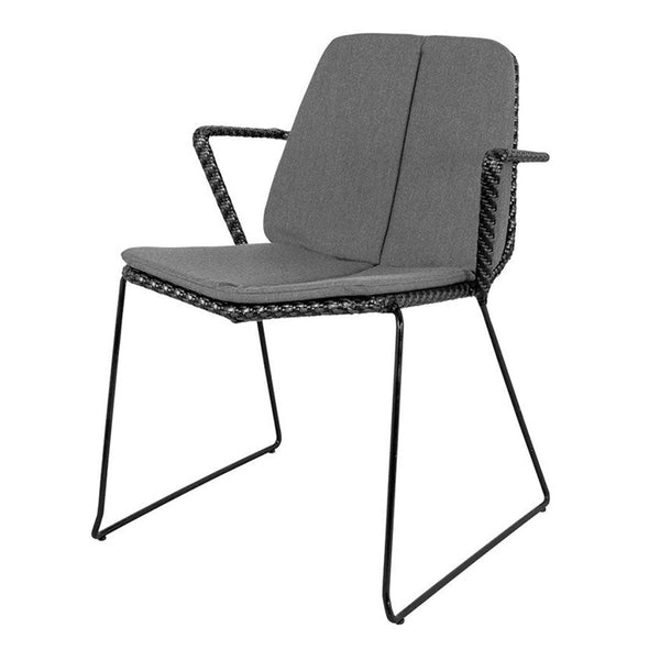 Gray upholstered chair with a sleek black metal frame and woven detail on the edges. Modern and minimalist design.