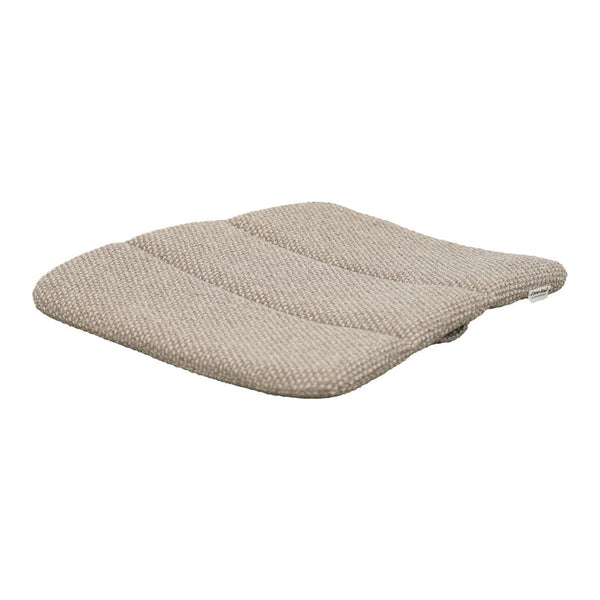 Beige cushion with subtle textured pattern and contoured shape for enhanced comfort and style. Perfect for any decor.
