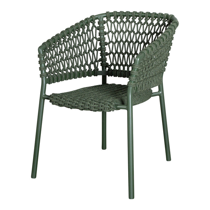 Green woven chair featuring a textured pattern and a sleek minimalist design for contemporary spaces.