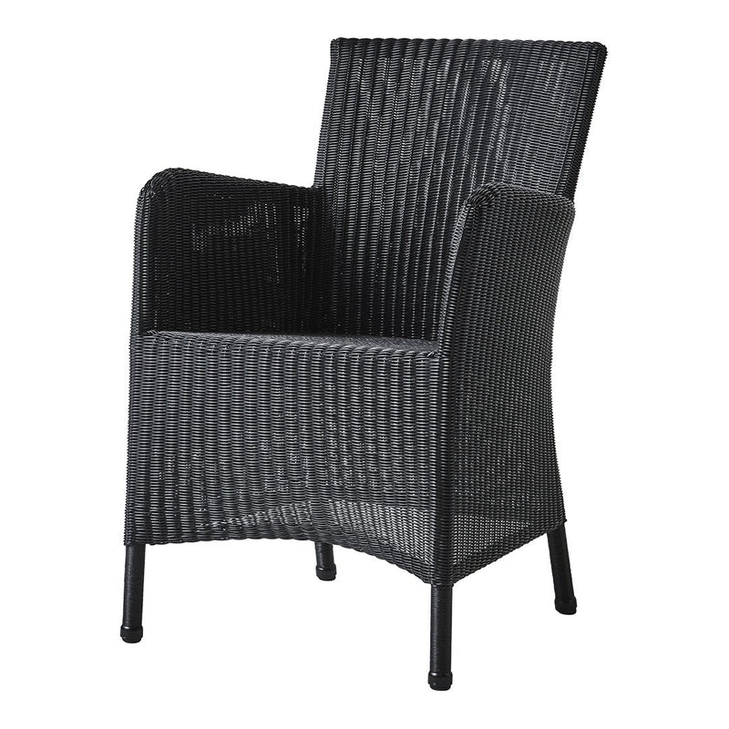 Black wicker armchair with a textured, woven pattern, highlighting a sleek and modern design.