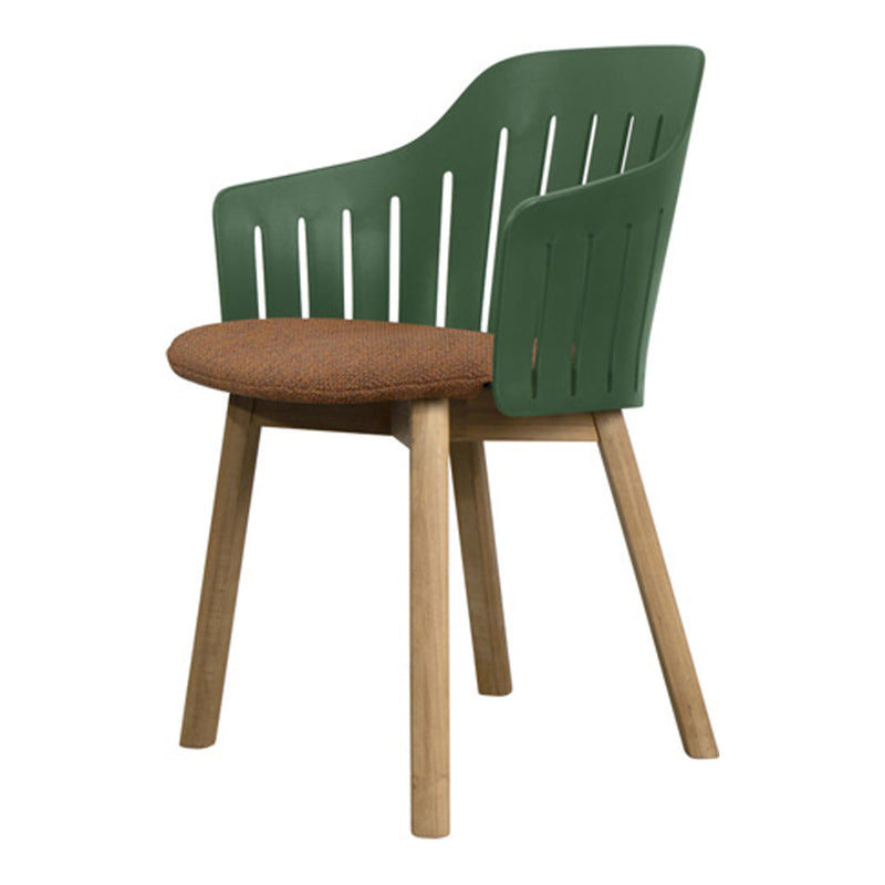 Green chair with a slatted back and brown upholstered seat, complemented by natural wood legs.