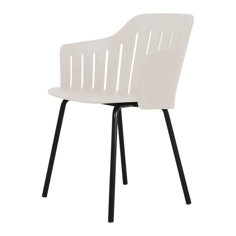 Light beige armchair with slatted back design and sleek black metal legs. Perfect for modern indoor or outdoor settings.