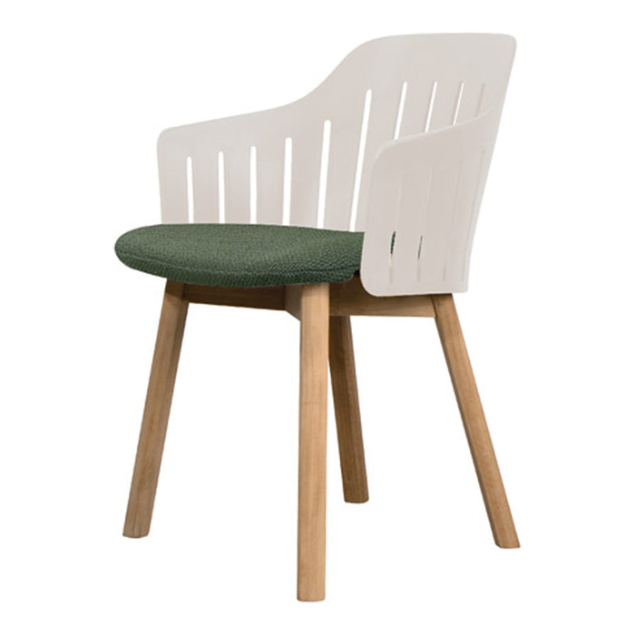 White wooden chair with a green fabric seat and natural wooden legs, featuring a modern slatted design.