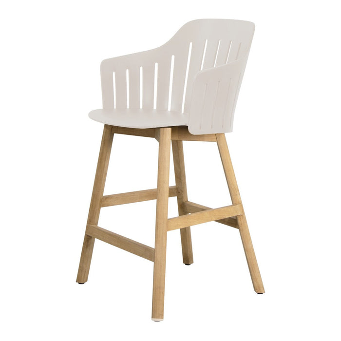 White high chair with slatted design and natural wood legs, stylish and modern for any space.