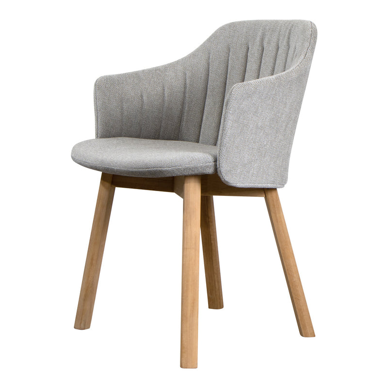 Gray upholstered chair with vertical ribbed pattern and light wooden legs. Modern, elegant design for home decor.