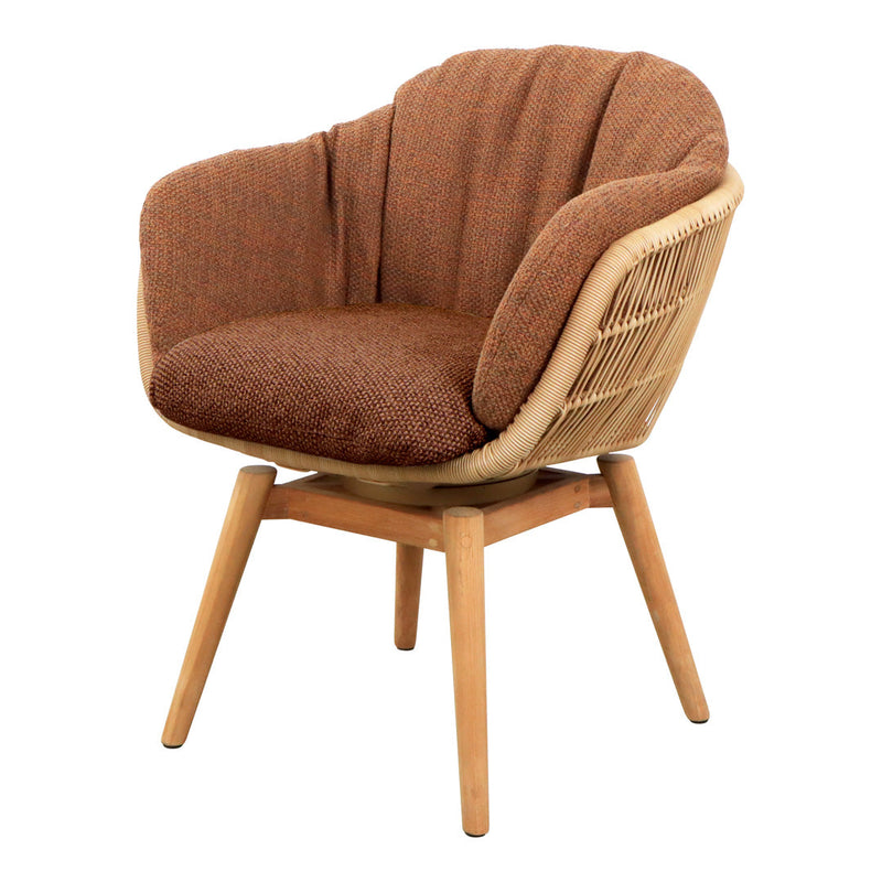 Brown fabric chair with textured upholstery and natural wicker accents; features light wooden legs.