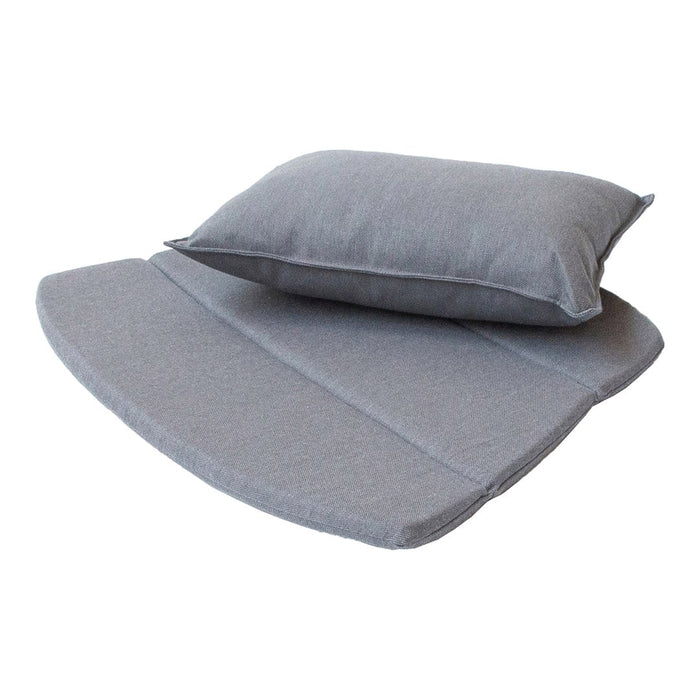 Gray fabric lounge cushion set with a smooth finish and subtle, textured patterns. Perfect for outdoor seating.