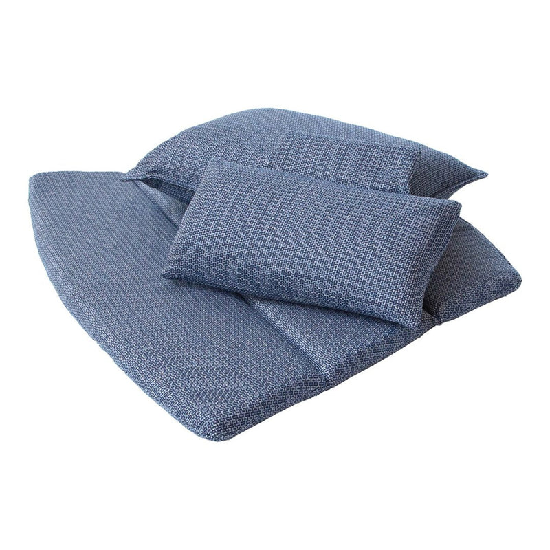 Textured blue cushions with varying sizes and a subtle checkered pattern, perfect for modern home decor.