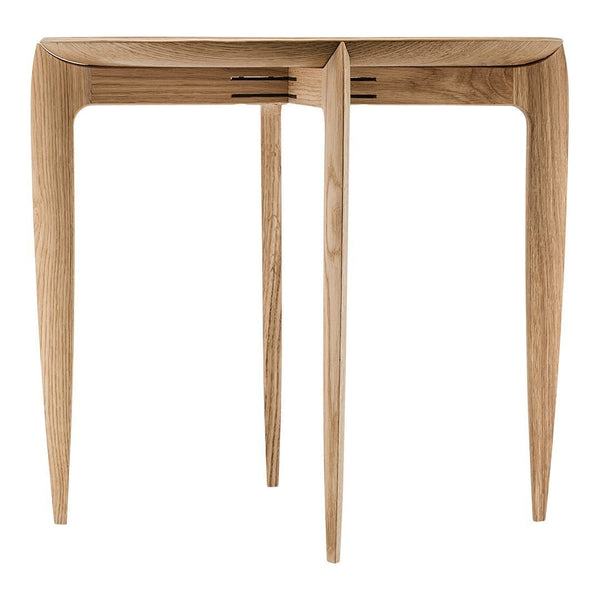 Light natural wood side table with sleek, minimalist design and subtle grain pattern. Perfect for modern decor.