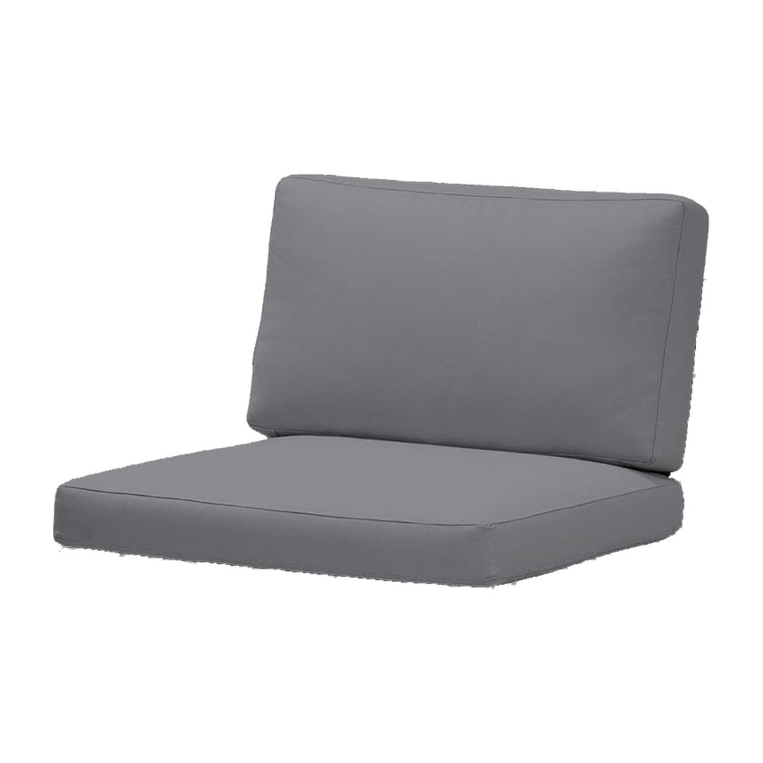 Gray outdoor cushion with a solid color design, featuring a sleek, modern look perfect for any patio setup.