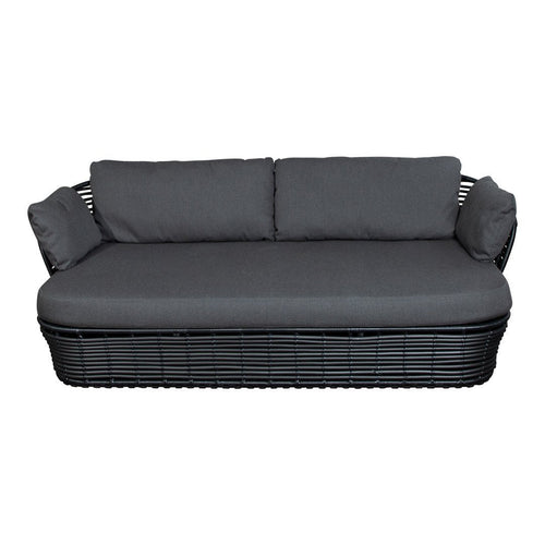 Black wicker sofa with gray cushions, featuring a sleek, modern design for outdoor or indoor use.