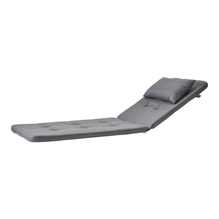 Gray adjustable lounge chair with tufted pattern and matching headrest pillow, perfect for outdoor relaxation.