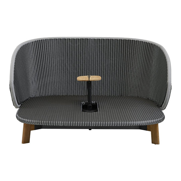 Gray striped sofa with a wood accent table, featuring a modern and sleek design perfect for contemporary spaces.