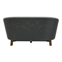 Gray and white checkered pattern on a curved sofa with wooden legs. Back view showcasing modern design.