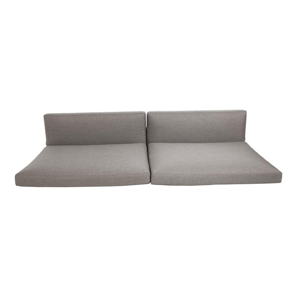 Gray modular sofa with a smooth, minimalist design and no visible patterns. Perfect for modern living spaces.