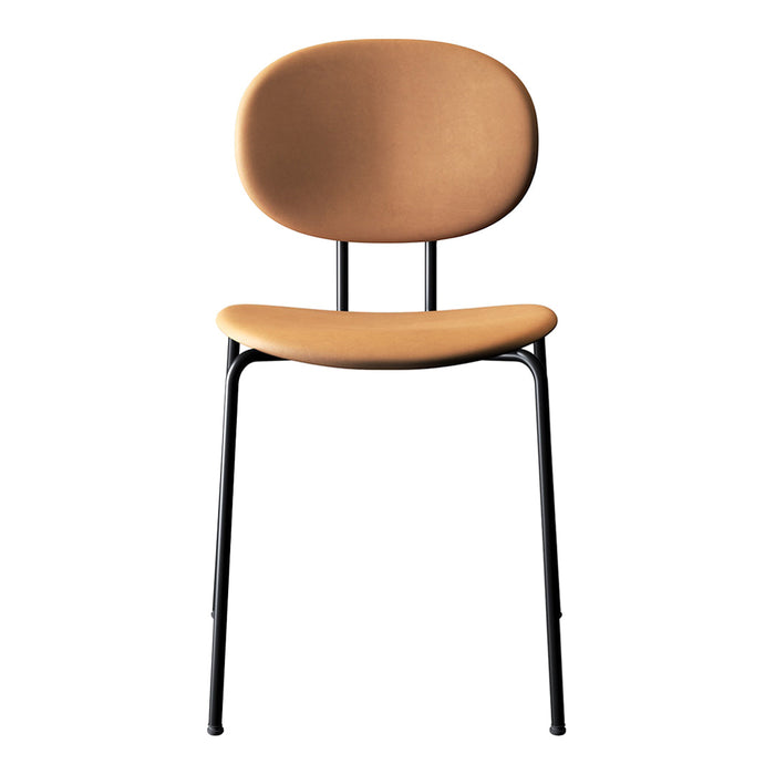 Modern tan upholstered chair with a minimalist black metal frame and smooth, rounded shapes. Ideal for contemporary spaces.