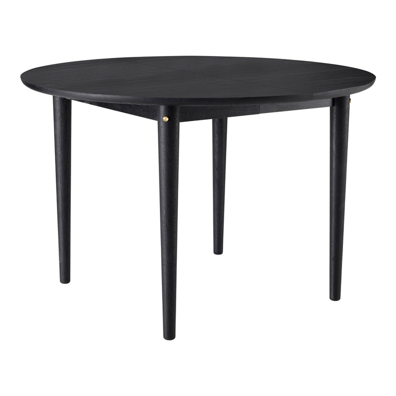 Round black table with smooth surface and sleek tapered legs, featuring a subtle golden accent. Perfect for modern decor.