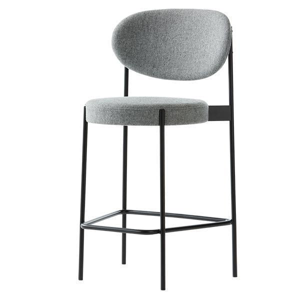 Gray upholstered bar stool with a sleek black metal frame, featuring a smooth finish and rounded backrest.