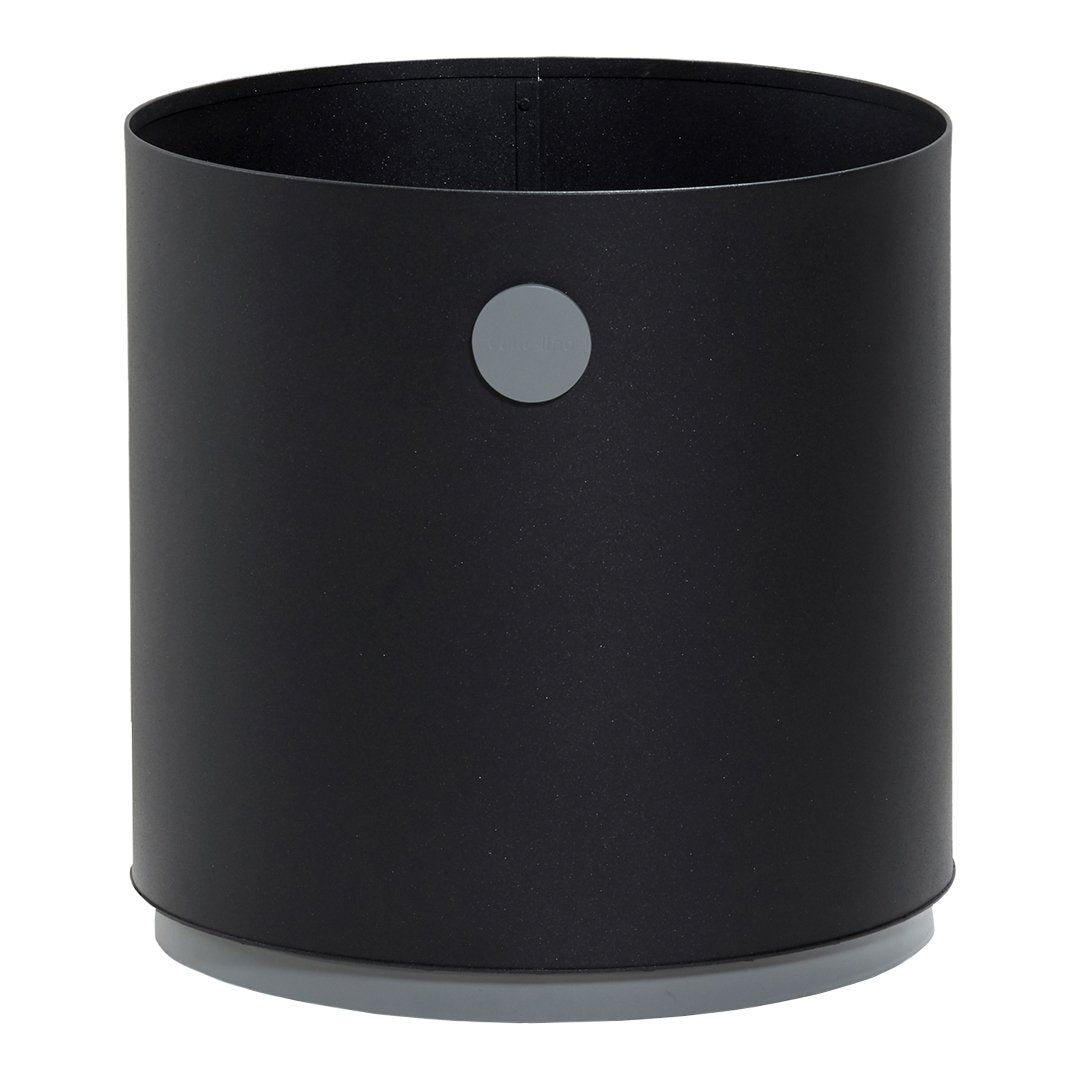 Black cylindrical planter with a smooth matte finish and a complementary grey circular accent.