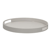 Light gray round tray with a smooth surface and cut-out handles, perfect for modern decor.