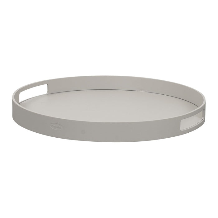 Light gray round tray with a smooth surface and cut-out handles, perfect for modern decor.