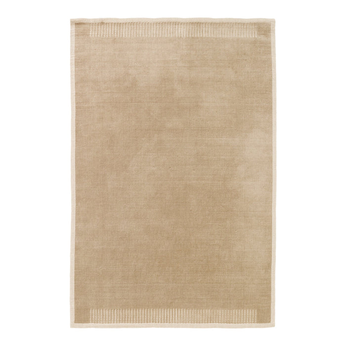 Beige area rug with subtle border pattern, perfect for neutral décor styles. Soft texture enhances any room.