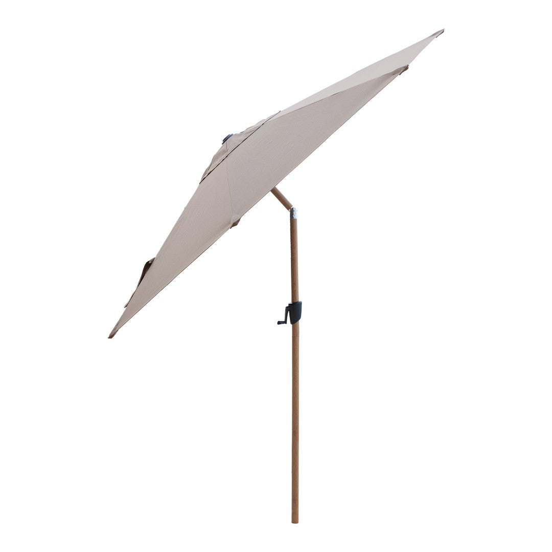 Beige patio umbrella with a simple, solid design and a brown wooden stand, ideal for outdoor relaxation.