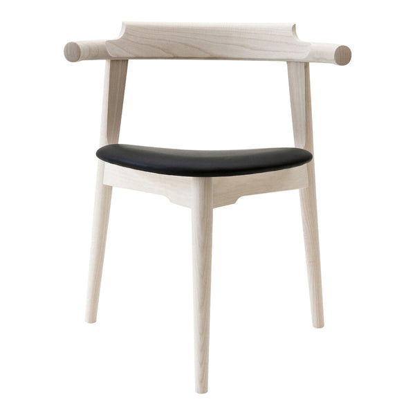 Light wood chair with a sleek black seat, featuring minimalist design and smooth, clean lines. Perfect for modern decor.