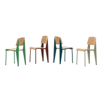 Colorful dining chairs in green, rust, teal, and pale green with a natural wood seat, showcasing modern design.