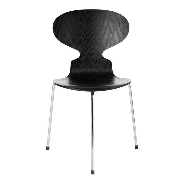 Black wooden chair with a distinctive curved design and chrome legs, showcasing a sleek, modern aesthetic.