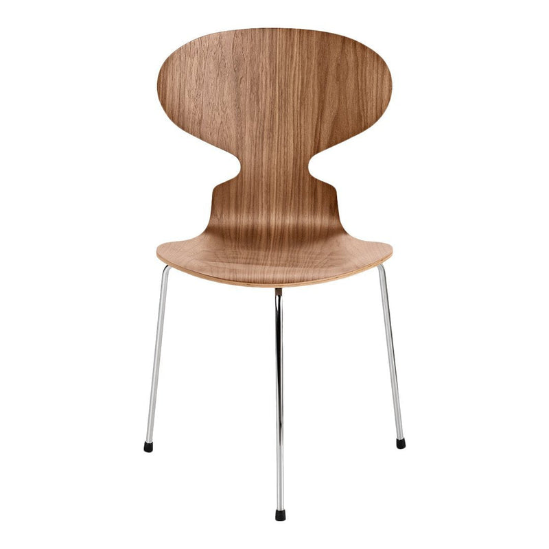 Natural wood finish with smooth, curved lines and sleek chrome legs for a modern, minimalist look.