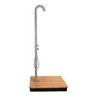 Outdoor shower with a sleek stainless steel finish and a natural wooden base featuring a clean, horizontal pattern.