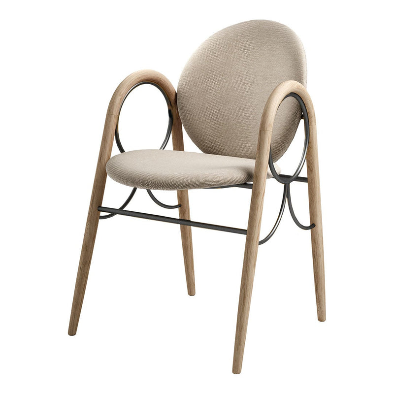 Beige upholstered chair with wood and black metal frame, featuring a smooth, rounded design and minimalistic aesthetic.