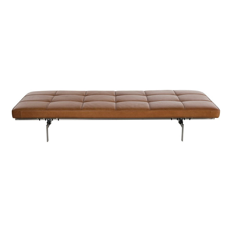 Tan tufted bench with sleek silver legs, featuring a smooth leather texture and minimalist design.