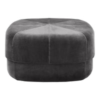 Gray velvet pouf with a geometric quilted pattern for modern décor. Stylish and versatile accent piece.