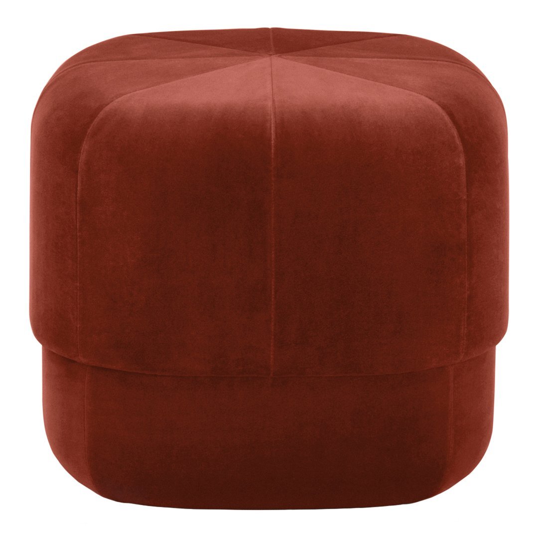 Rust-colored velvet pouf with a soft, geometric design and smooth finish. Ideal for modern home decor.