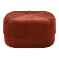 Rust-colored velvet pouf with a geometric pattern and smooth, soft texture for stylish home decor.