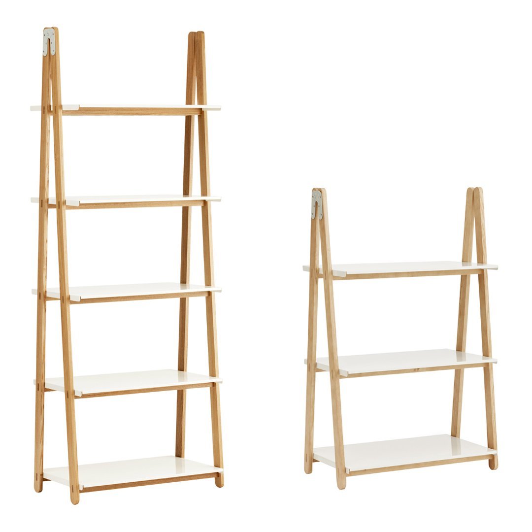 Scandinavian-style wooden ladder shelf in natural wood tones with white shelves, featuring a minimalist design.