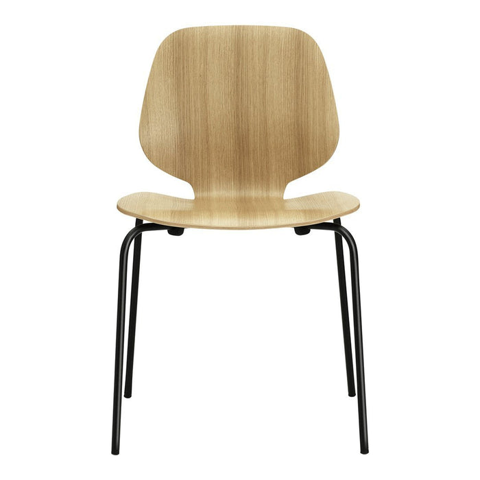 Natural wood grain chair with a smooth finish, featuring a minimalist design and black metal legs.