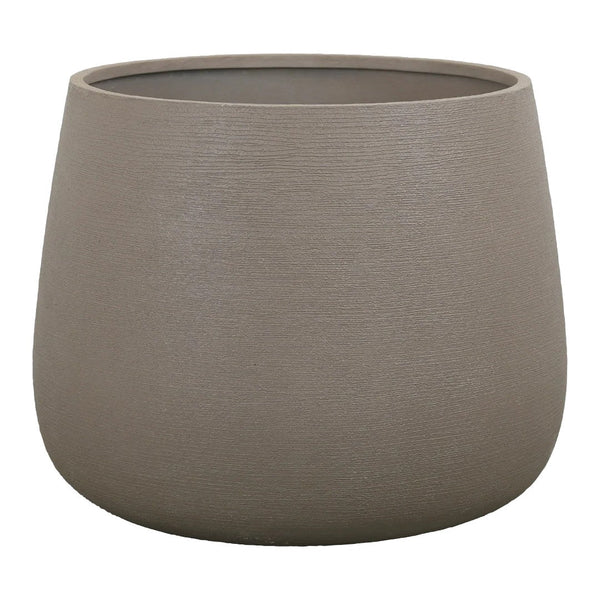 "Round beige planter with a subtle textured finish, perfect for modern decor."