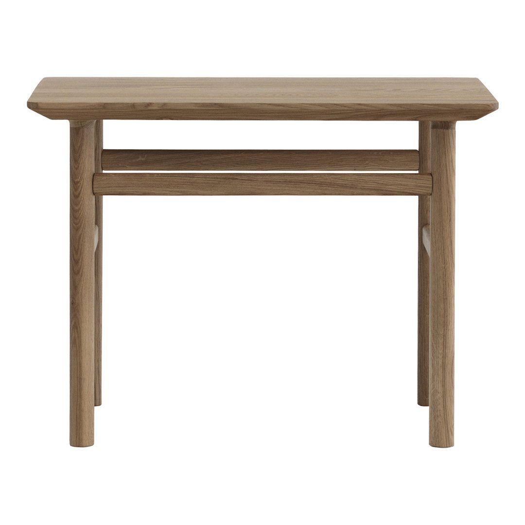 Light brown wooden table with a smooth finish and simple, clean lines. Ideal for minimalist decor.