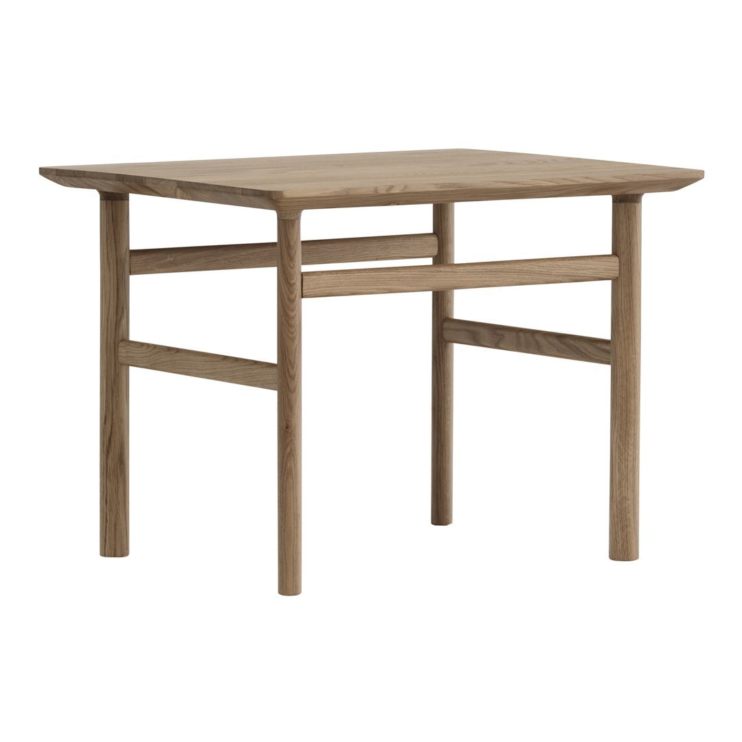 Light brown wooden dining table with a minimalist design, featuring smooth surfaces and subtle grain patterns.