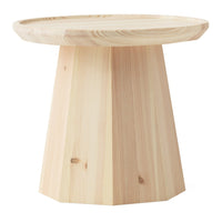 Natural wood round table with a light beige finish and a smooth, minimalist design.